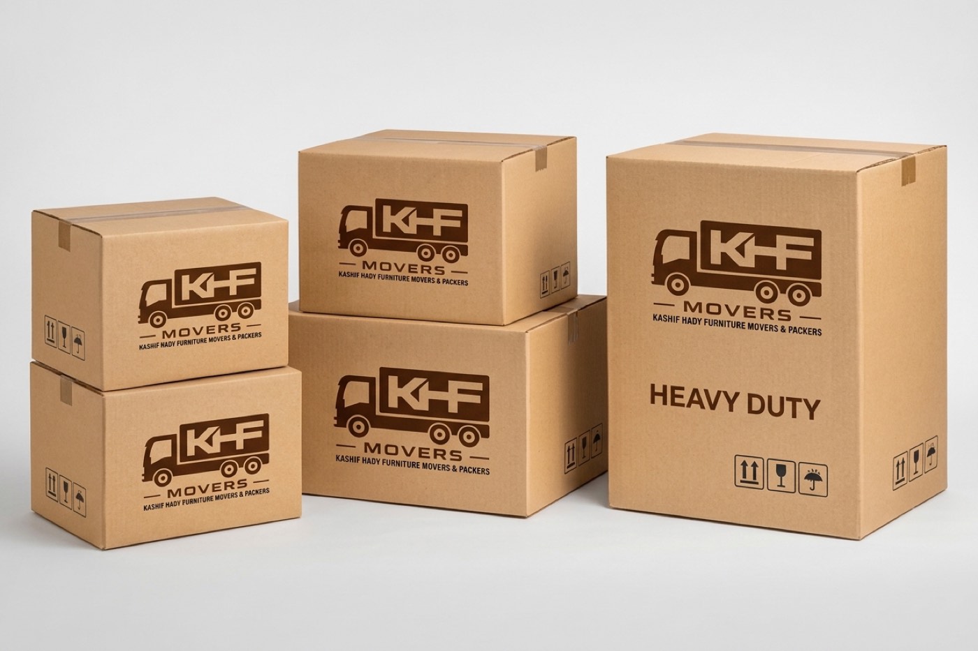 Stack of heavy-duty cardboard boxes branded with the KHF Movers logo.